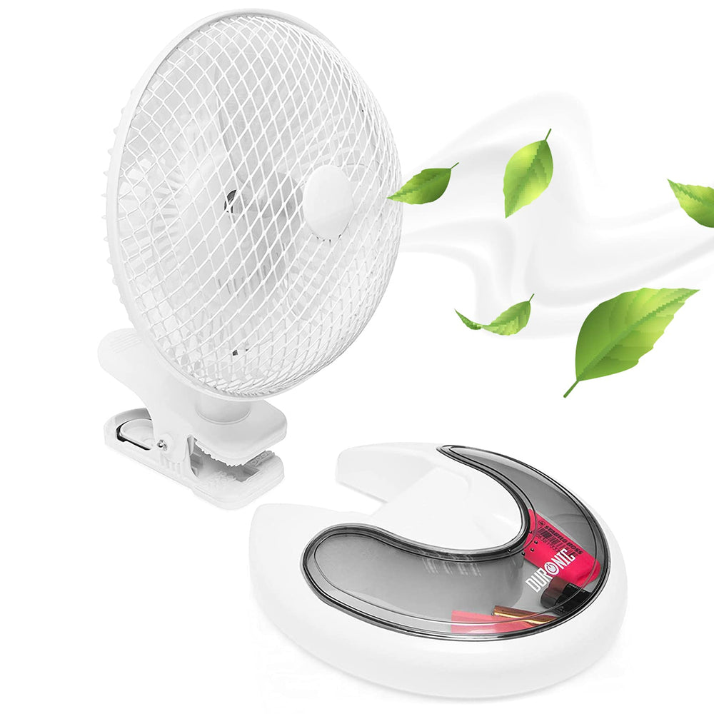 Duronic FN15 Ventilador de sobremesa 15W | 2 en 1 Base Fija y Pinza Integrada | Instalación en pared y mesa | Silencioso + compartimento para objetos | 2 velocidades | Mini Portátil Pequeño Giratorio | Mostrando el ventilador de sobremesa en color blanco con su diseño 2 en 1, separado de su base con compartimento integrado para objetos y mostrando un clip de pinza junto a hojas flotantes que simbolizan el flujo de aire