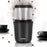 Duronic CG250 Molinillo de Café Eléctrico 250 W, Capacidad para 75 g | Mostrando el molinillo de café eléctrico en color negro con un recipiente superior transparente y tazas de café a los lados con granos y café molido dispersos decorativamente