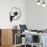 Duronic FN55 Ventilador de pared Mostrando el ventilador de pared instalado en una oficina moderna y profesional sobre un mueble de madera